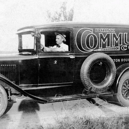 Orphe Donat Badeau driving a Community Coffee Truck in 1931